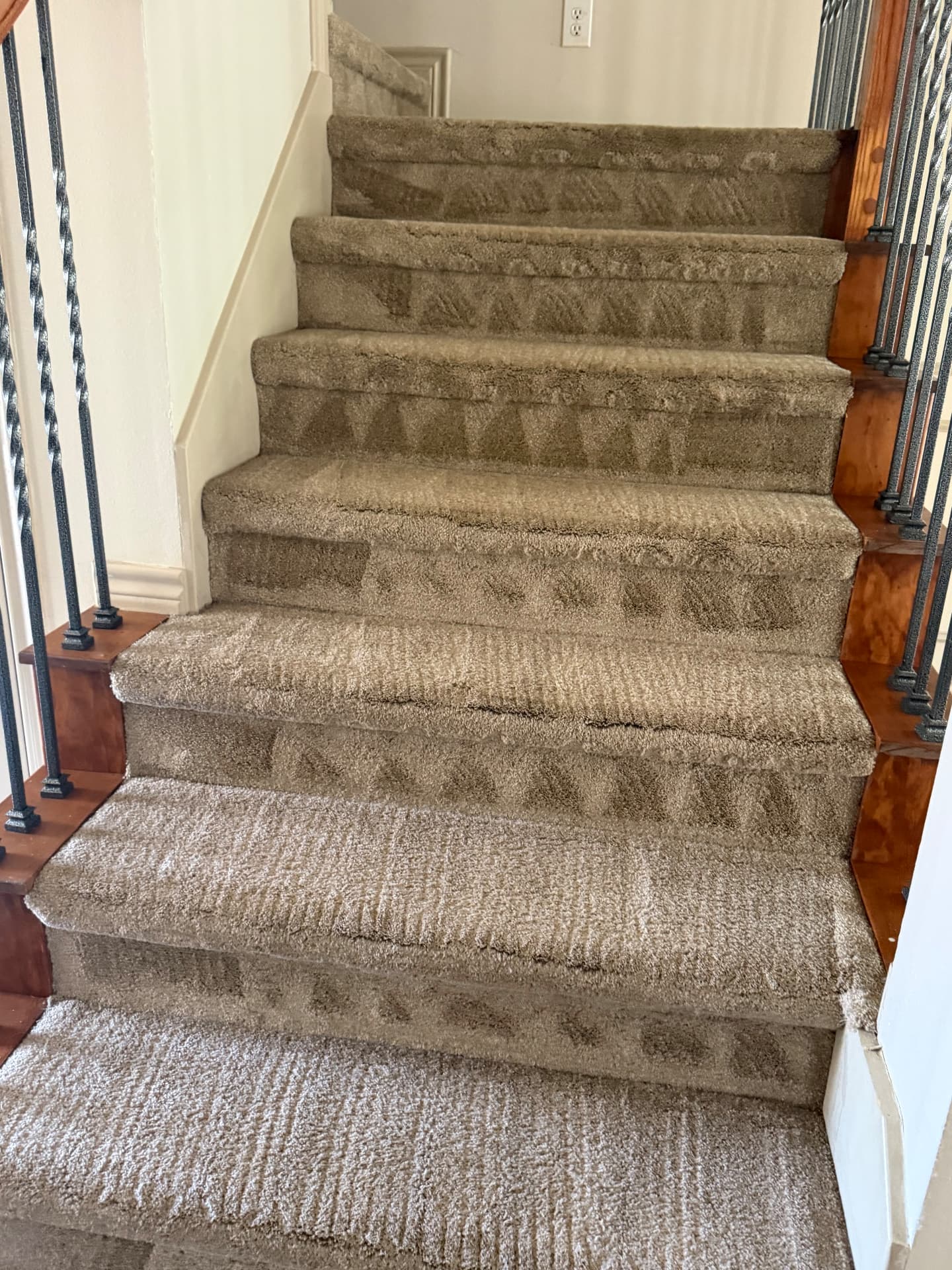 Heavily soiled carpeted stairs before deep cleaning